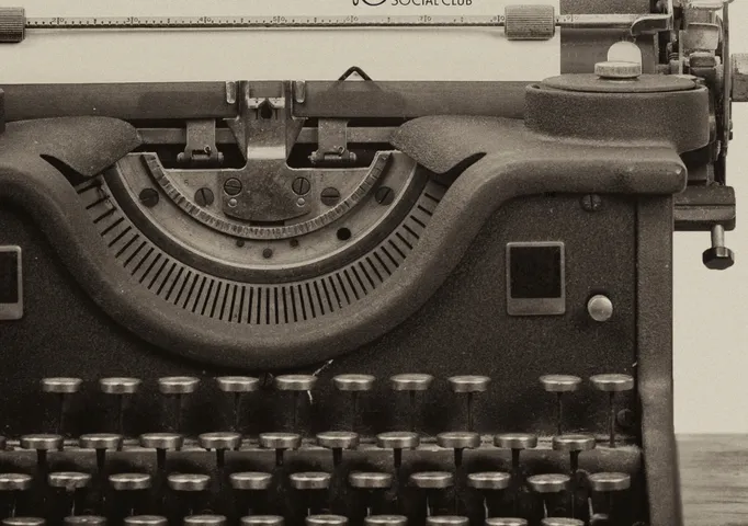Friday Night Writes announcement on typewriter